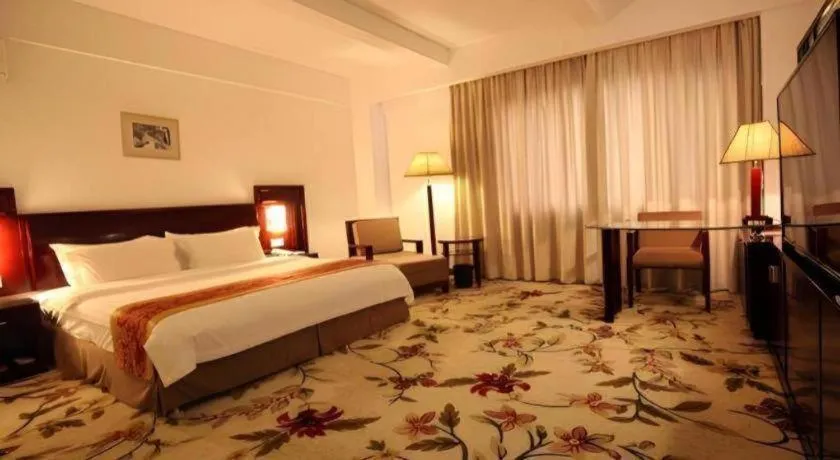 Bed in Hong Ye Hotel