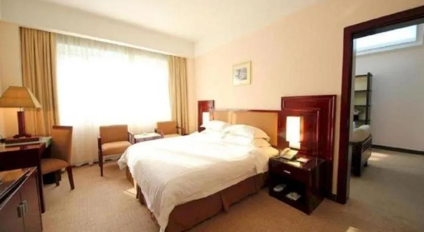 Bed in Hong Ye Hotel