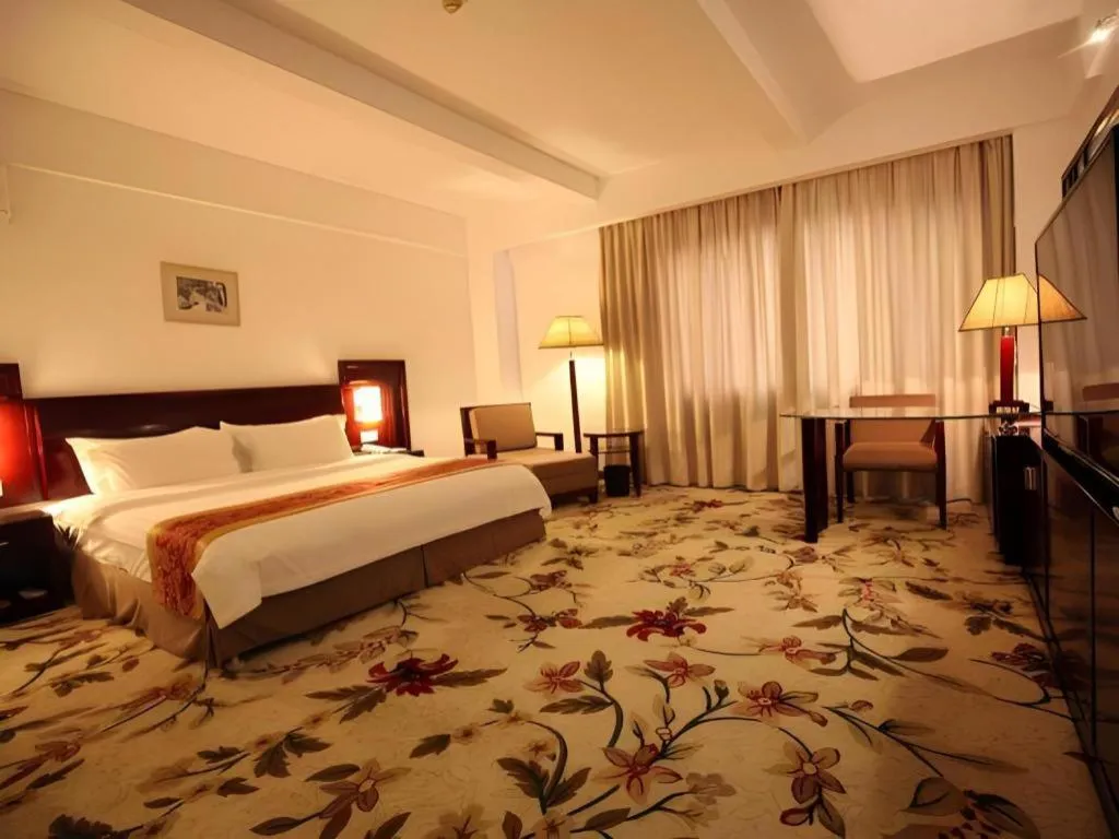 Bed in Hong Ye Hotel