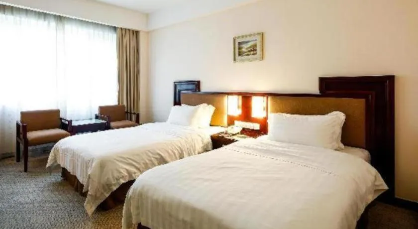 Bed in Hong Ye Hotel