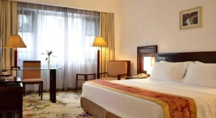 Bed in Hong Ye Hotel