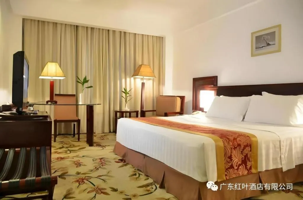 Bed in Hong Ye Hotel