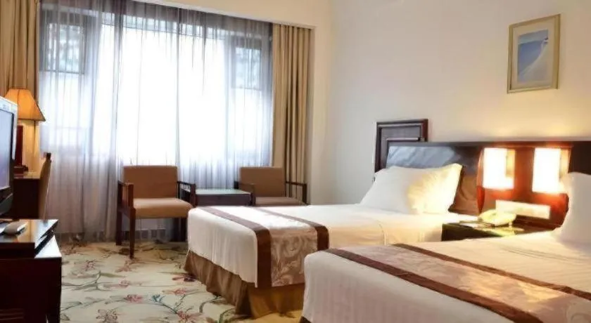 Bed in Hong Ye Hotel