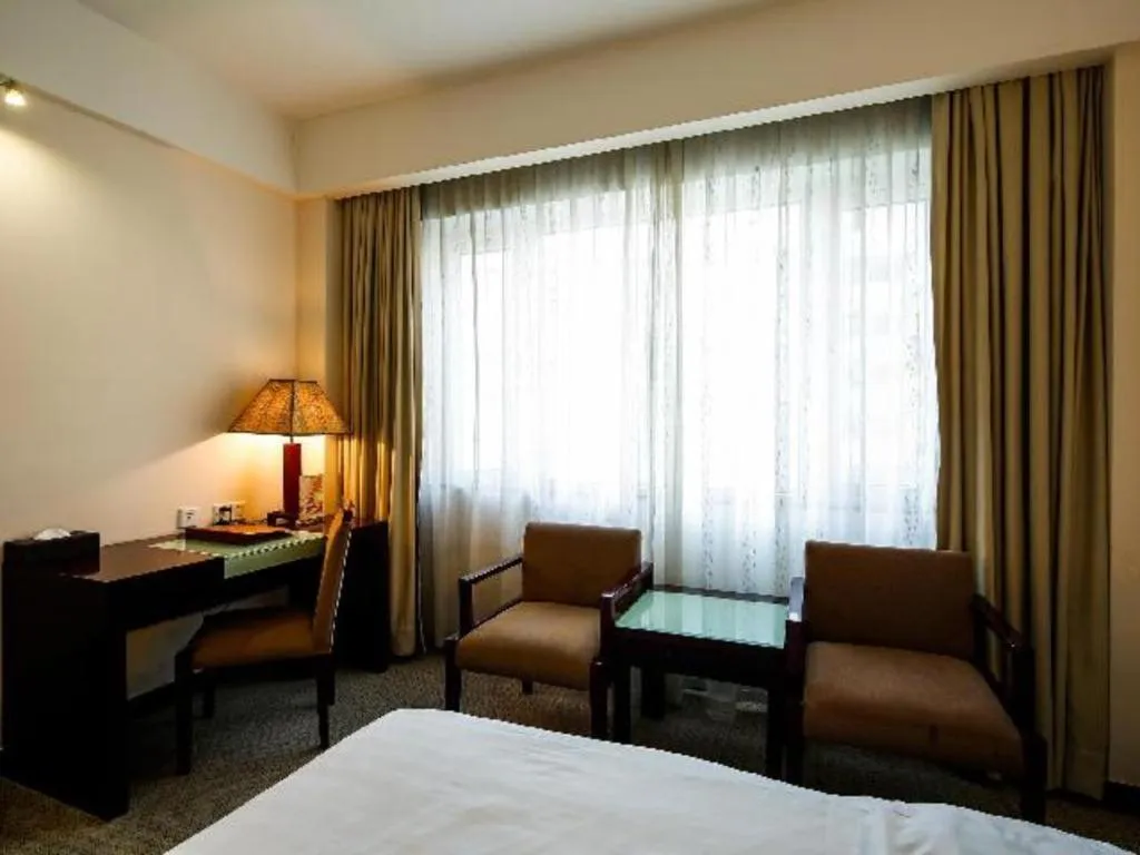 Bed in Hong Ye Hotel