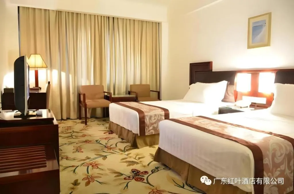 Bed in Hong Ye Hotel