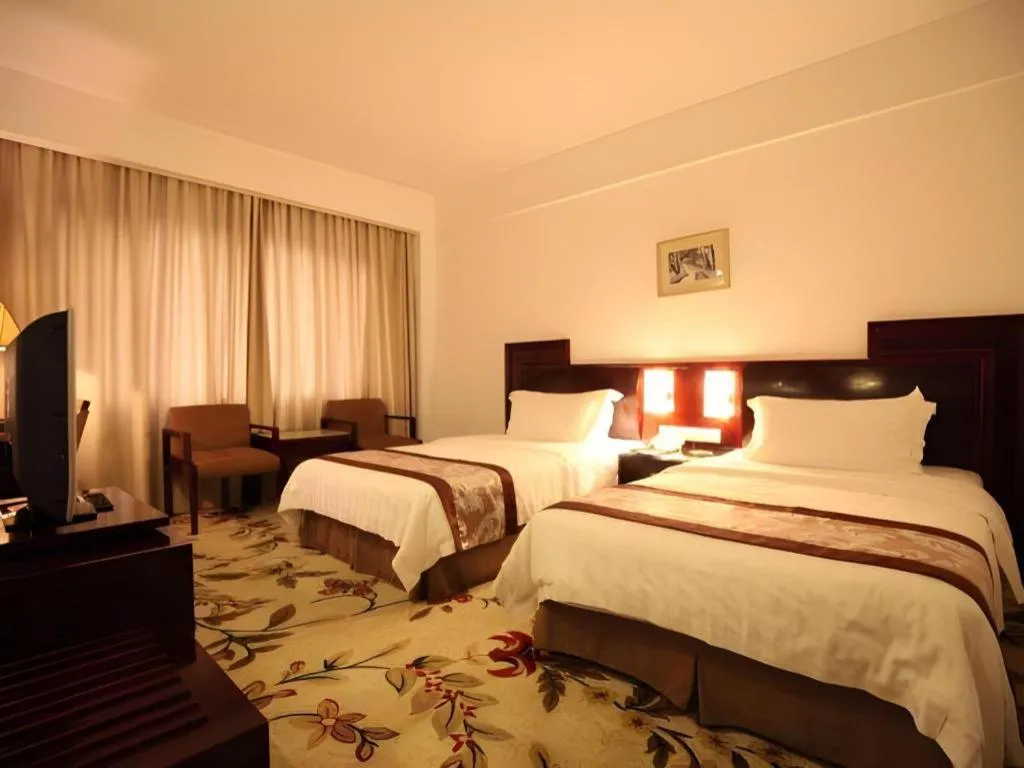 Bed in Hong Ye Hotel