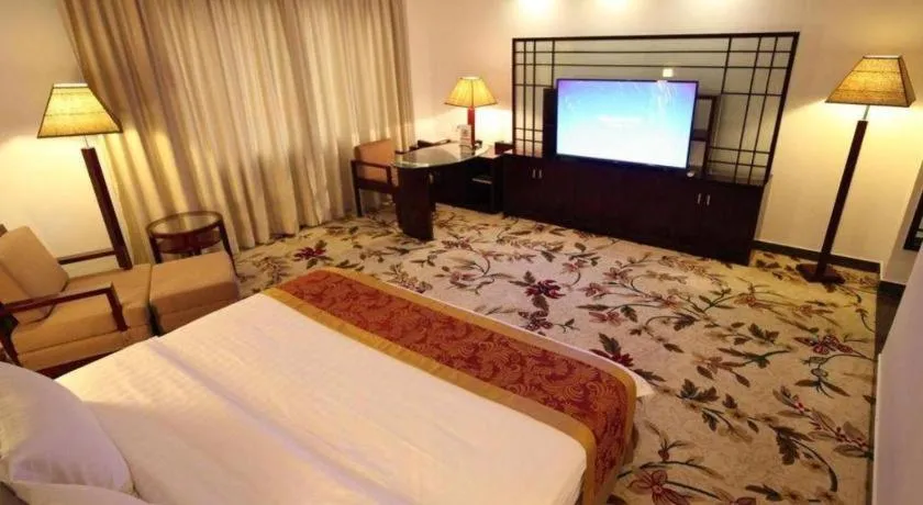 Bed in Hong Ye Hotel