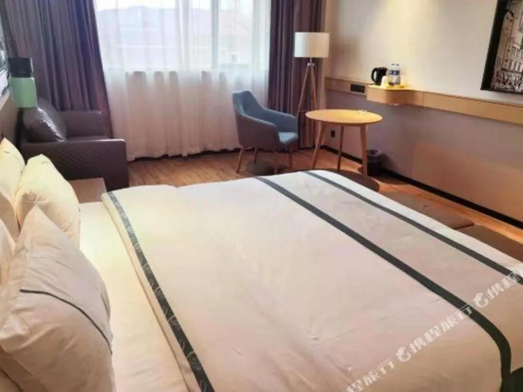 Bed in City Comfort Inn Jingzhou Gongan Chengshi Square