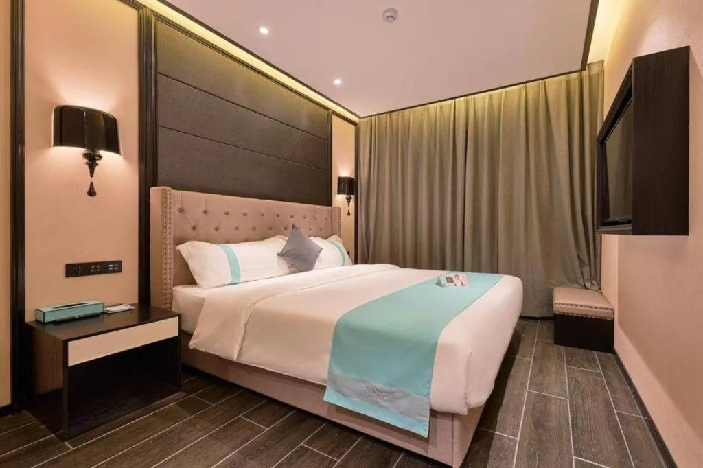 Bed in Xana Hotelle Beijing Fengtai Railway Station Tiantan Hospital