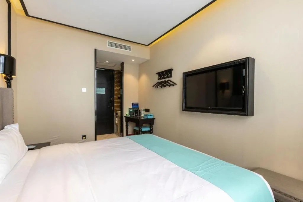 Bed in Xana Hotelle Beijing Fengtai Railway Station Tiantan Hospital