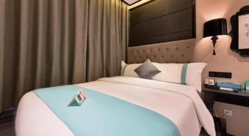 Bed in Xana Hotelle Beijing Fengtai Railway Station Tiantan Hospital