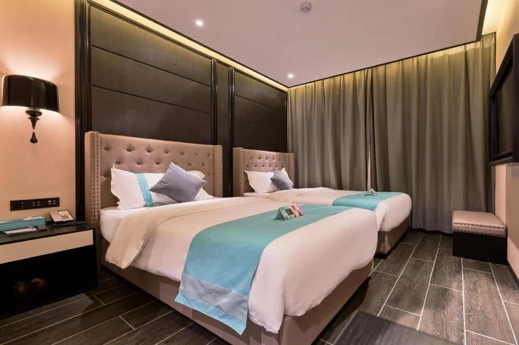 Bed in Xana Hotelle Beijing Fengtai Railway Station Tiantan Hospital