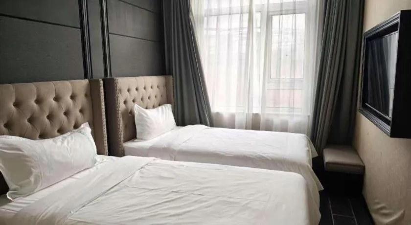 Bed in Xana Hotelle Beijing Fengtai Railway Station Tiantan Hospital