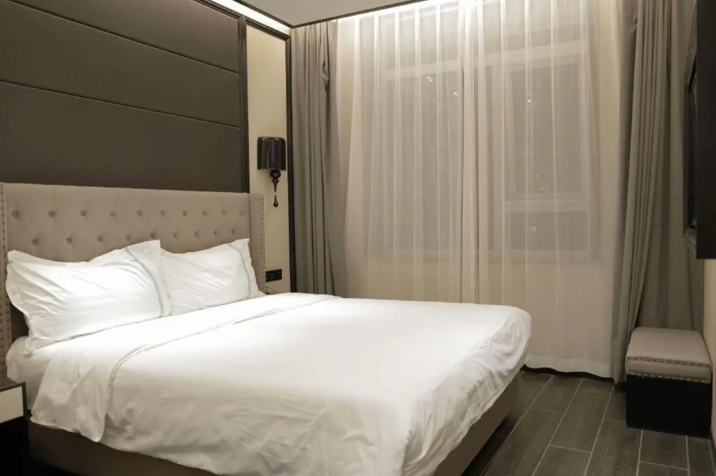 Bed in Xana Hotelle Beijing Fengtai Railway Station Tiantan Hospital