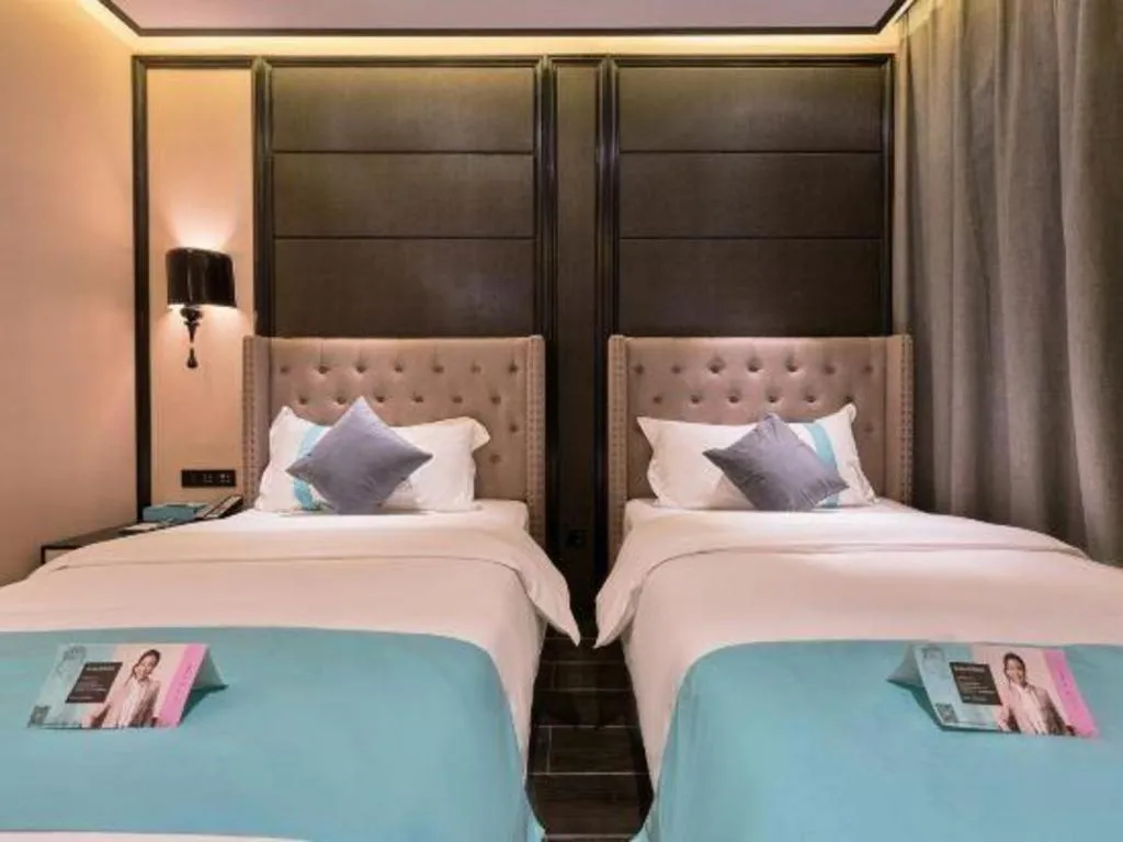 Bed in Xana Hotelle Beijing Fengtai Railway Station Tiantan Hospital