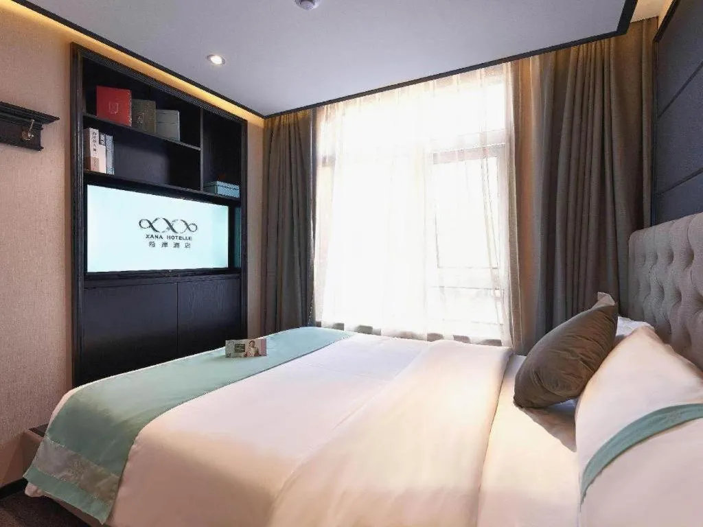 Bed in Xana Hotelle Beijing Fengtai Railway Station Tiantan Hospital