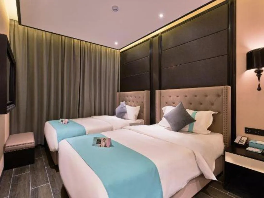 Bed in Xana Hotelle Beijing Fengtai Railway Station Tiantan Hospital