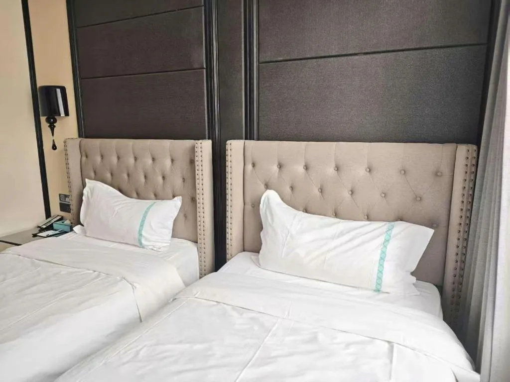 Bed in Xana Hotelle Beijing Fengtai Railway Station Tiantan Hospital