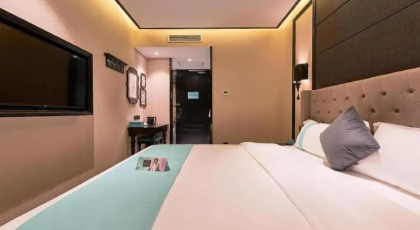 Bed in Xana Hotelle Beijing Fengtai Railway Station Tiantan Hospital