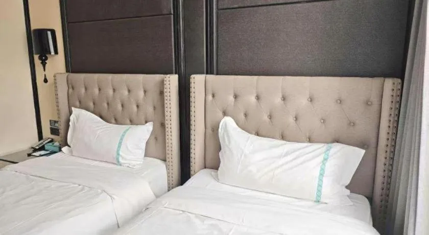 Bed in Xana Hotelle Beijing Fengtai Railway Station Tiantan Hospital