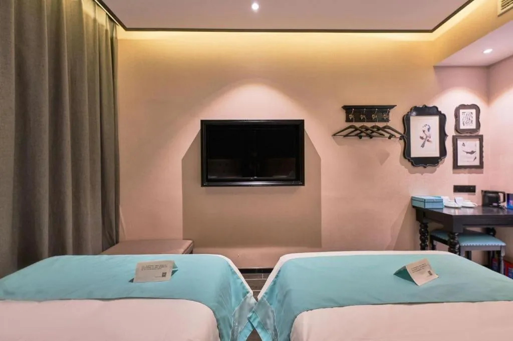 Bed in Xana Hotelle Beijing Fengtai Railway Station Tiantan Hospital