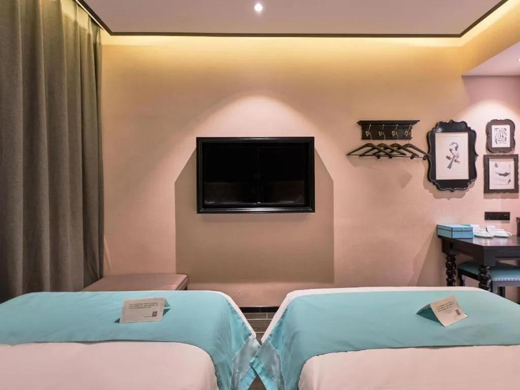 Bed in Xana Hotelle Beijing Fengtai Railway Station Tiantan Hospital