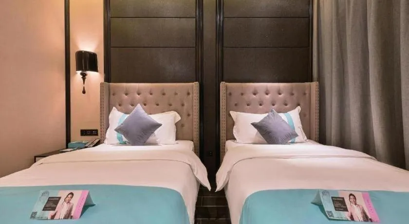 Bed in Xana Hotelle Beijing Fengtai Railway Station Tiantan Hospital