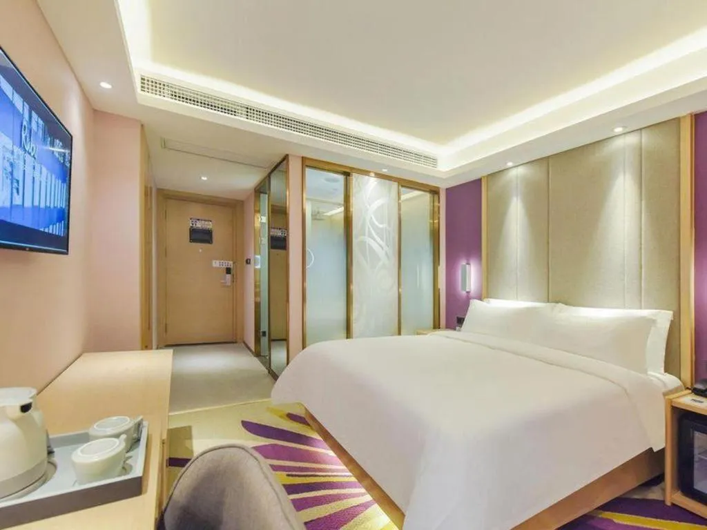 Bed in Lavande Hotel Chongqing Xinghui Liangjiang Happiness Plaza