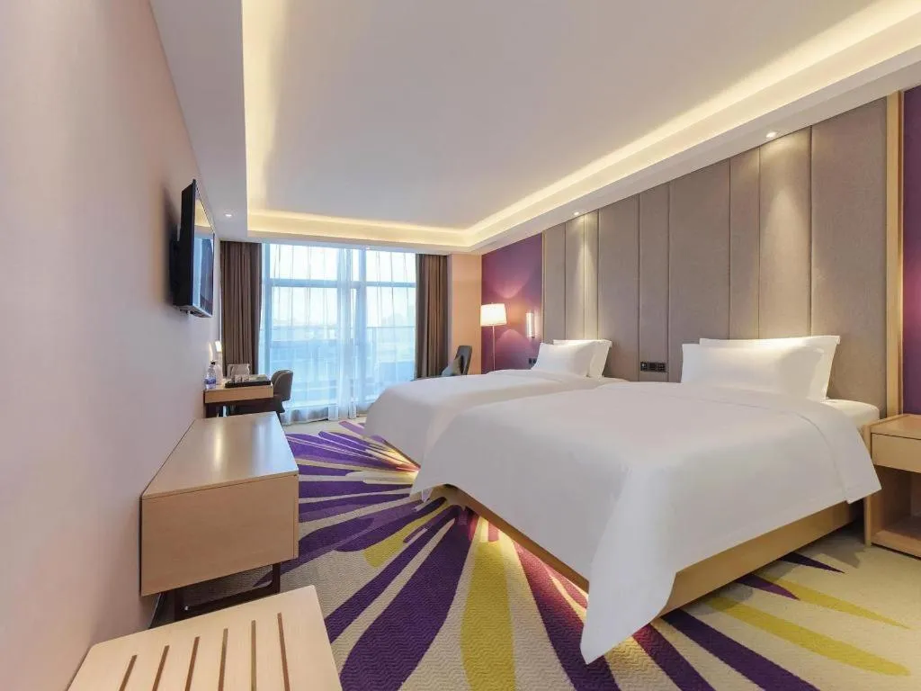Bed in Lavande Hotel Chongqing Xinghui Liangjiang Happiness Plaza