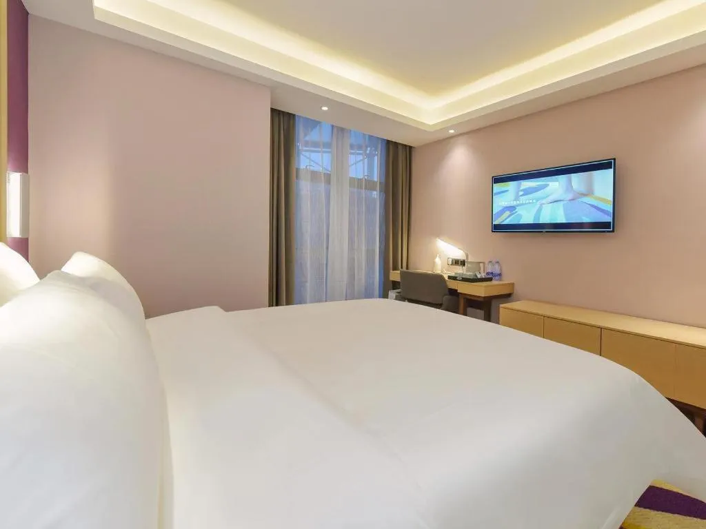 Bed in Lavande Hotel Chongqing Xinghui Liangjiang Happiness Plaza