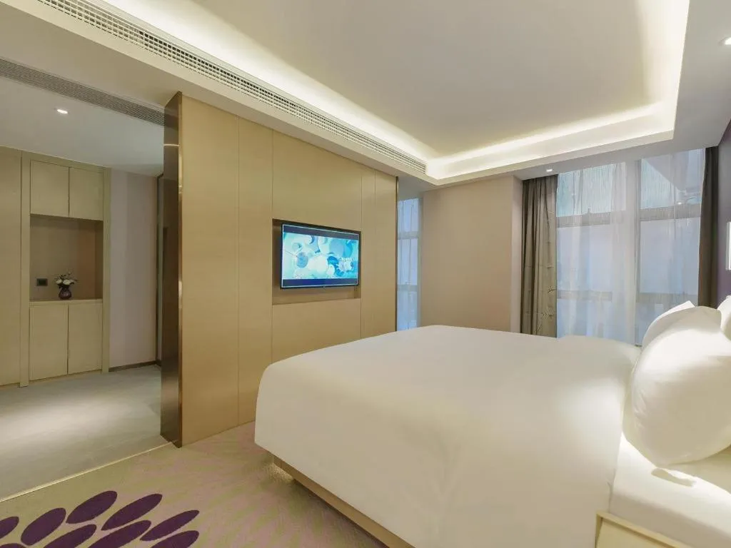Bed in Lavande Hotel Chongqing Xinghui Liangjiang Happiness Plaza