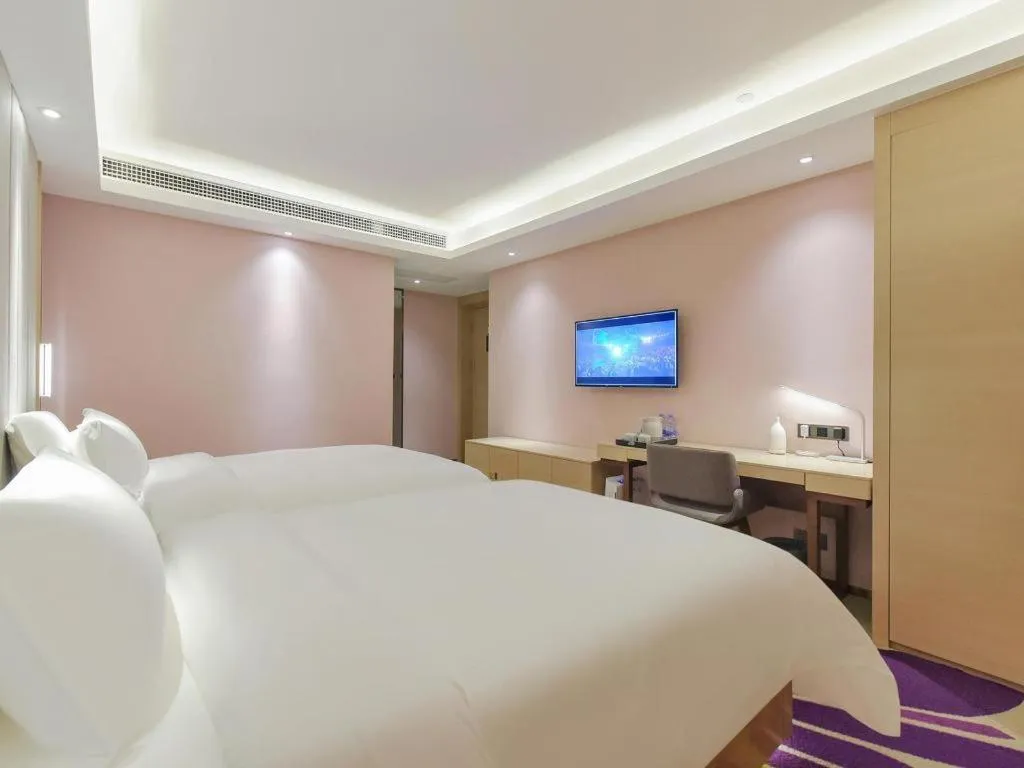 Bed in Lavande Hotel Chongqing Xinghui Liangjiang Happiness Plaza