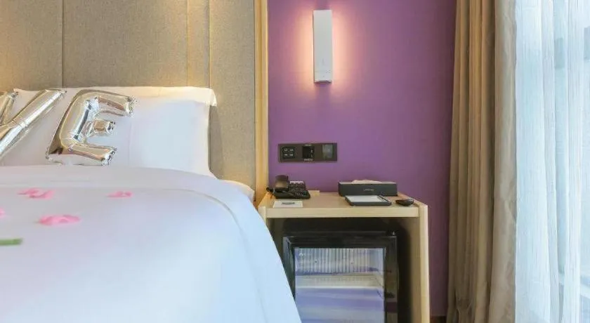 Bed in Lavande Hotel Chongqing Xinghui Liangjiang Happiness Plaza