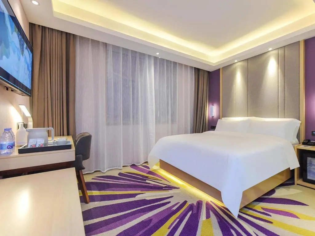 Bed in Lavande Hotel Chongqing Xinghui Liangjiang Happiness Plaza
