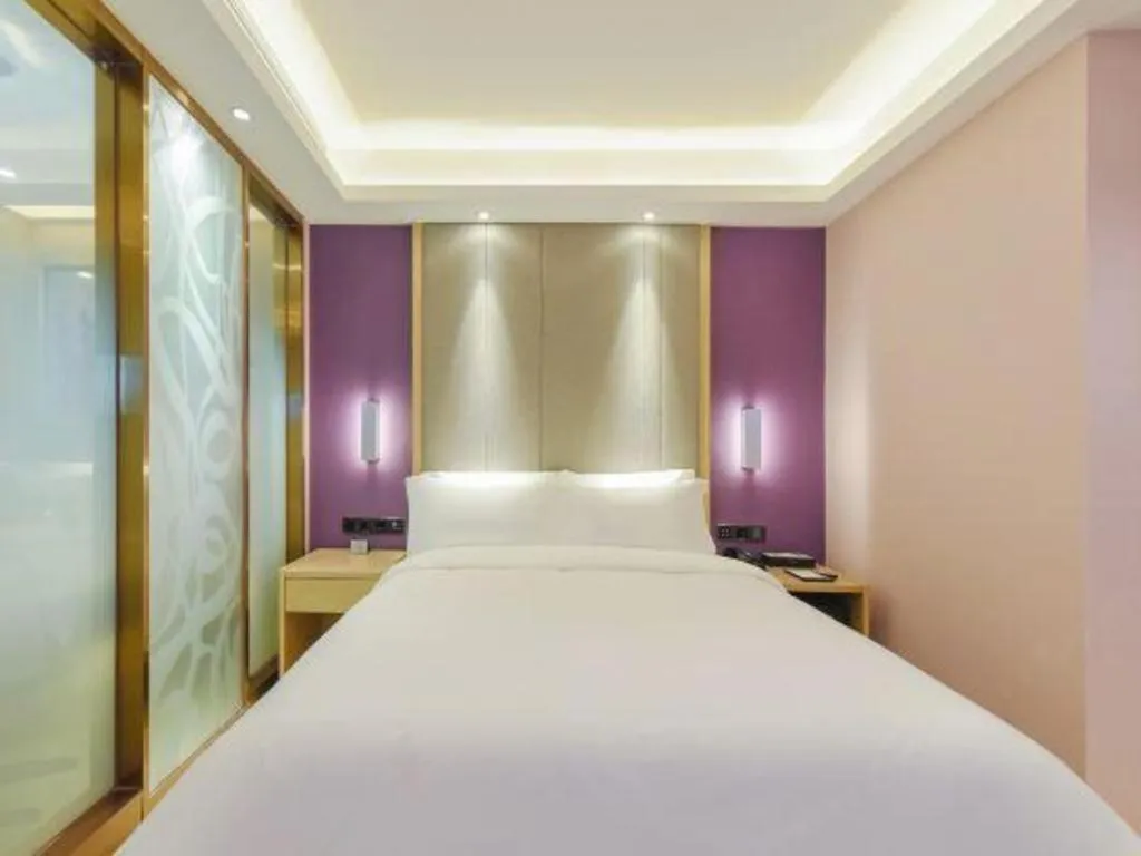 Bed in Lavande Hotel Chongqing Xinghui Liangjiang Happiness Plaza
