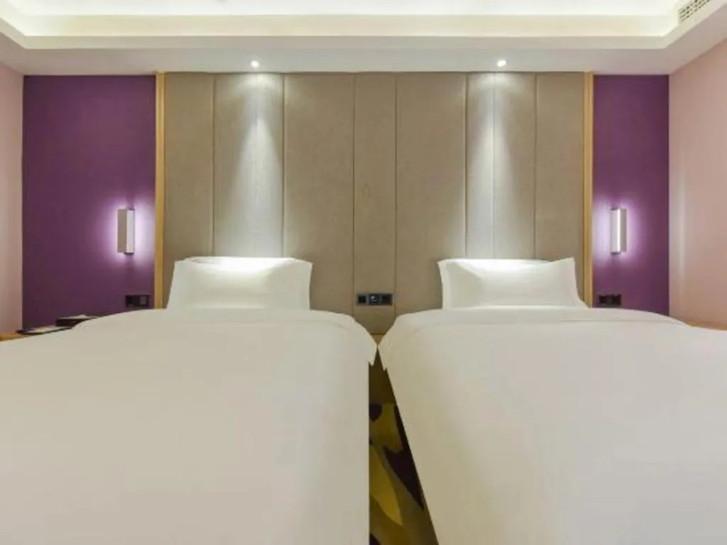 Bed in Lavande Hotel Chongqing Xinghui Liangjiang Happiness Plaza
