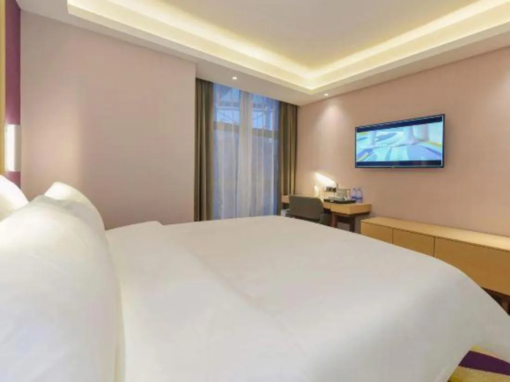 Bed in Lavande Hotel Chongqing Xinghui Liangjiang Happiness Plaza