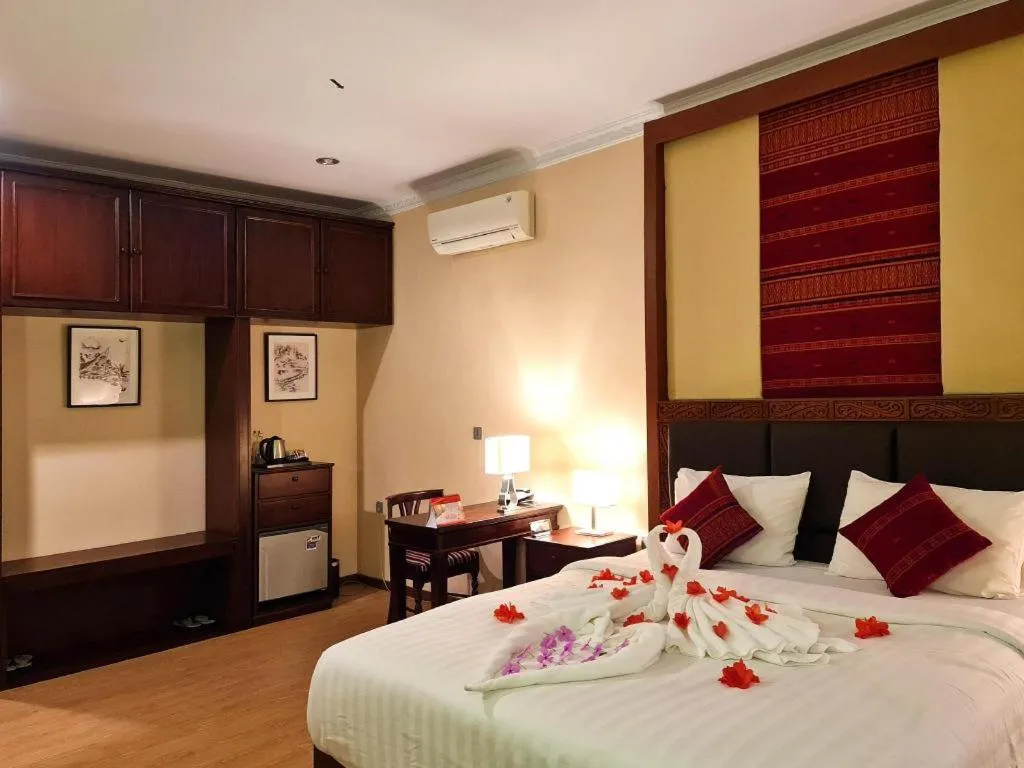 Bed in Toba Beach Hotel