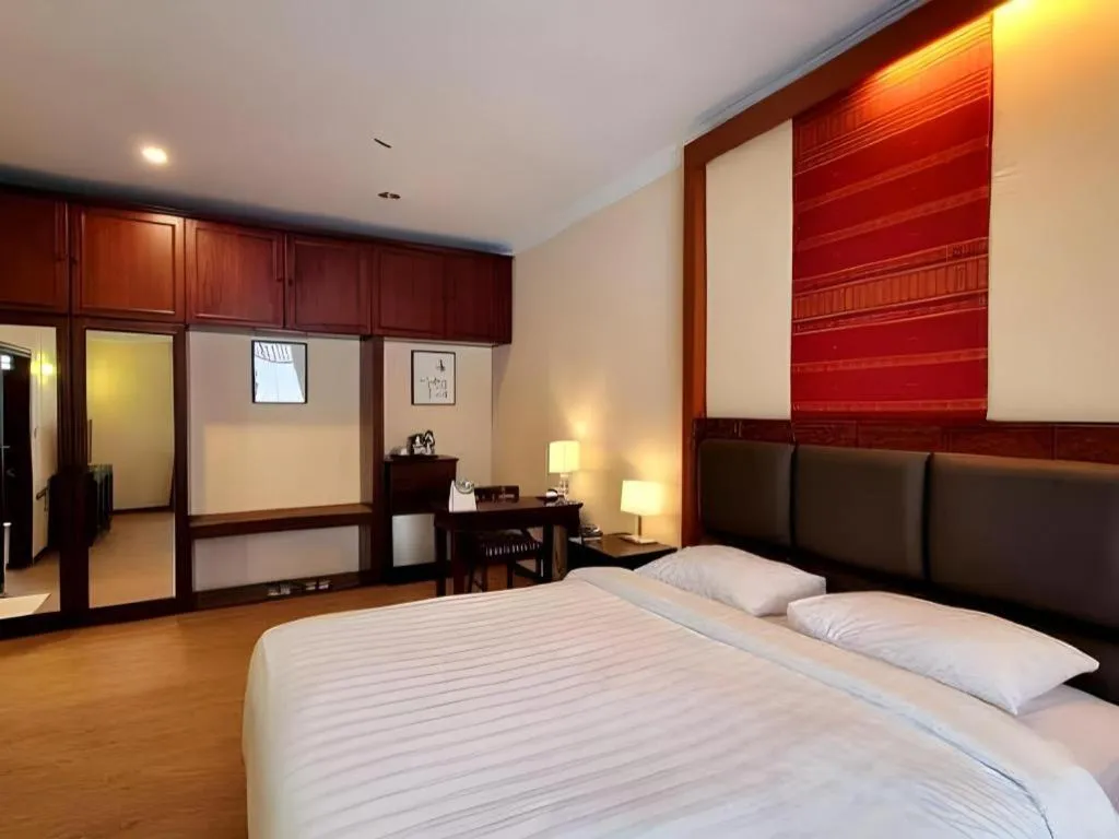 Bed in Toba Beach Hotel