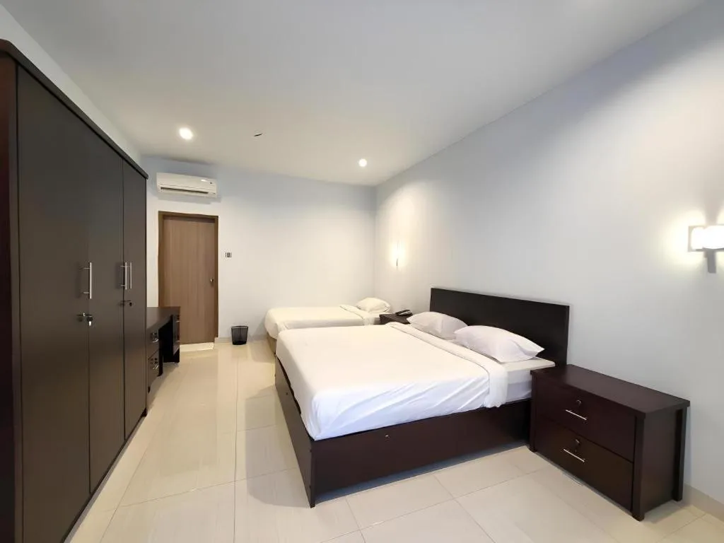 Bed in Toba Beach Hotel