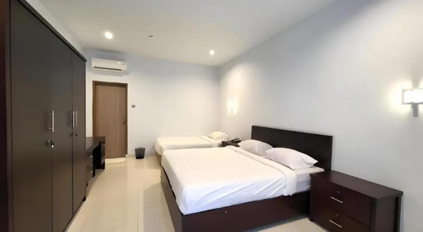 Bed in Toba Beach Hotel