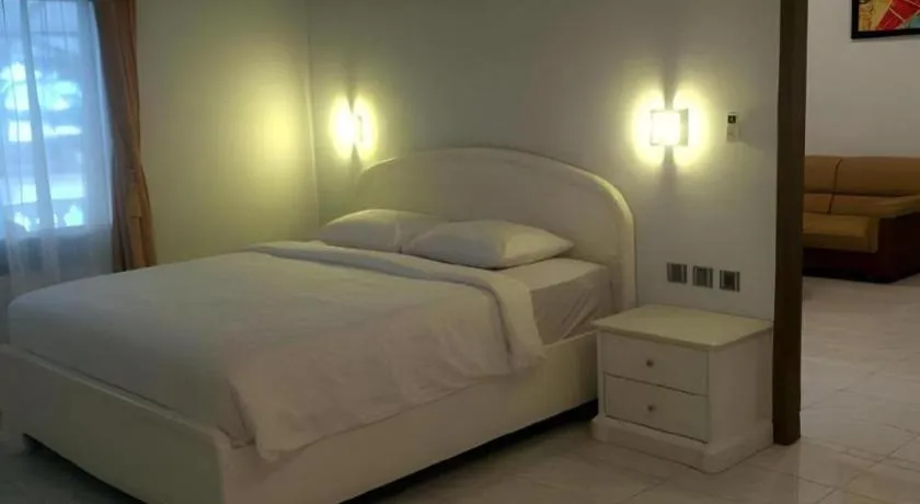 Bed in Toba Beach Hotel