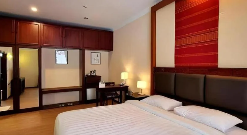 Bed in Toba Beach Hotel