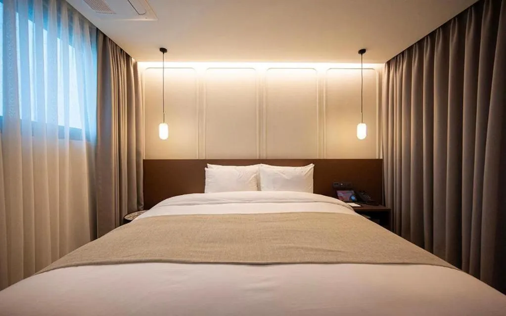 Bed in HOTEL D EDITION