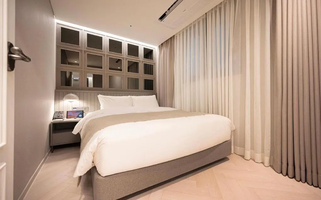 Bed in HOTEL D EDITION