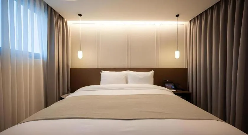 Bed in HOTEL D EDITION