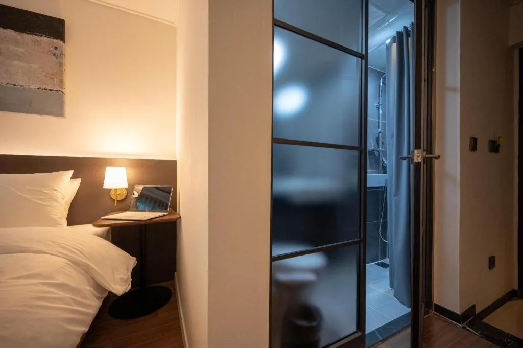 Bed in HOTEL D EDITION