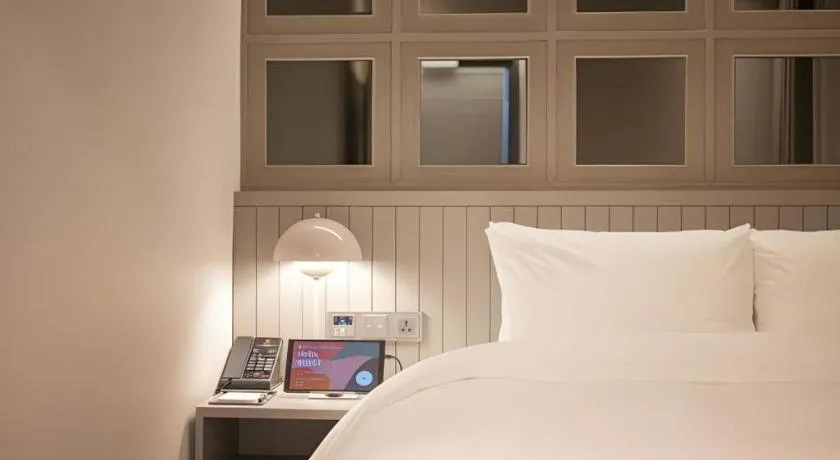 Bed in HOTEL D EDITION