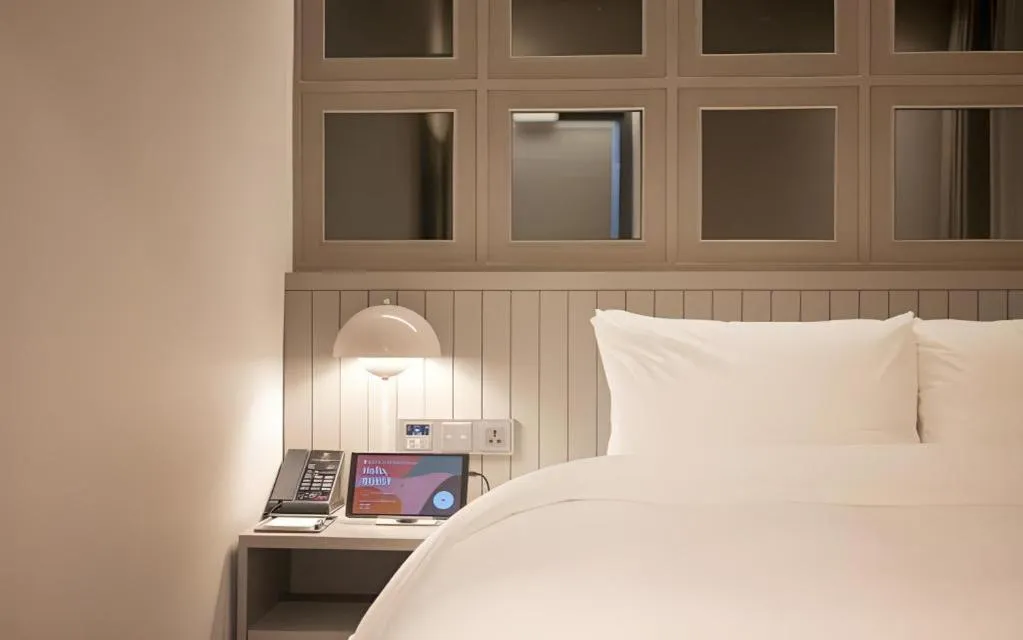 Bed in HOTEL D EDITION