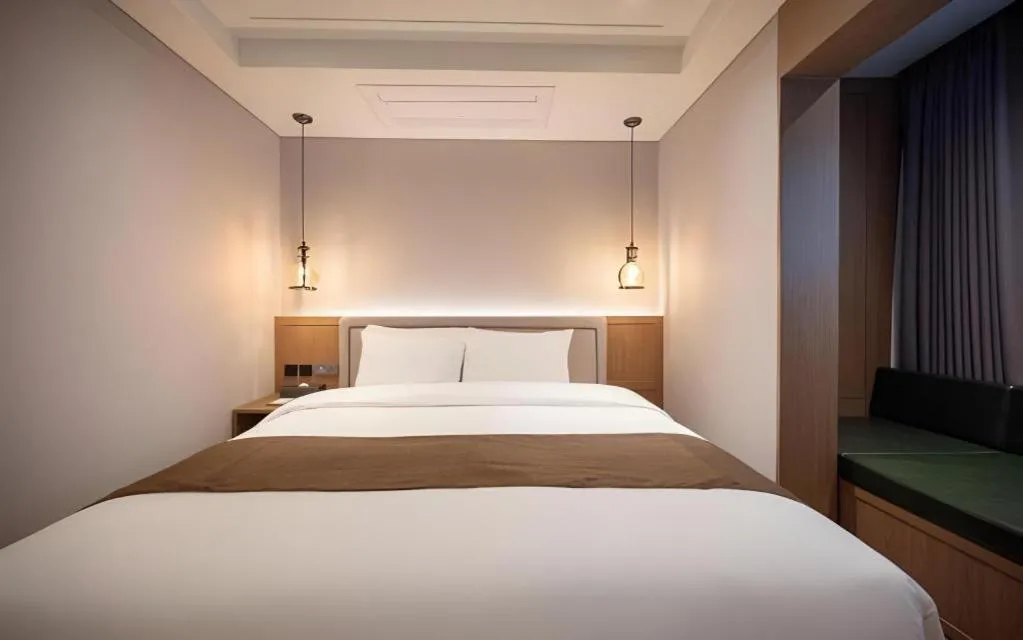 Bed in HOTEL D EDITION